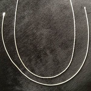 2 Beautiful Sterling Silver Chain necklaces (see pics)